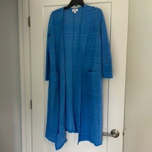 Small, blue floor length Lularoe sweater with horizontal texture stripes